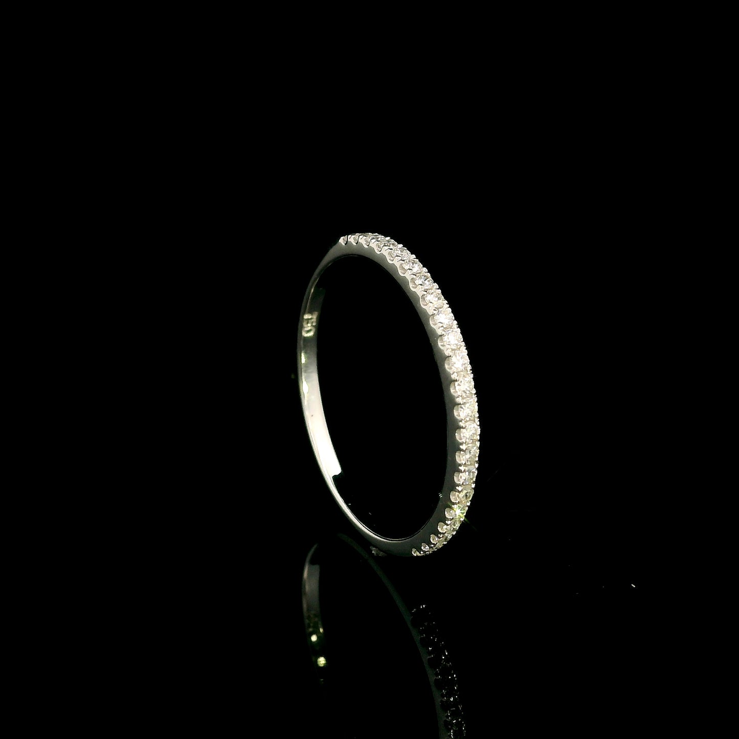 Oval cut diamond bridal set in 18K white gold featuring a GIA certified 1.50 carat natural oval diamond with matching diamond wedding band.