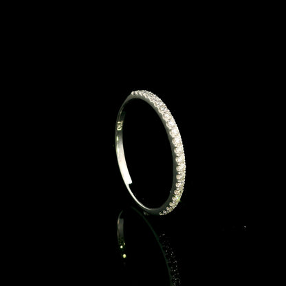 Oval cut diamond bridal set in 18K white gold featuring a GIA certified 1.50 carat natural oval diamond with matching diamond wedding band.