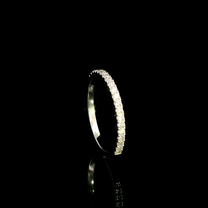 Round diamond bridal set in 18K white gold with GIA certified natural diamond engagement ring and matching diamond wedding band.