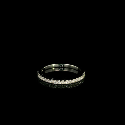 Round diamond bridal set in 18K white gold with GIA certified natural diamond engagement ring and matching diamond wedding band.