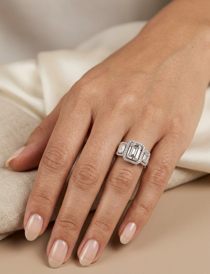 Round and baguette diamond statement ring in 18K white gold with 1.34 carats of natural diamonds