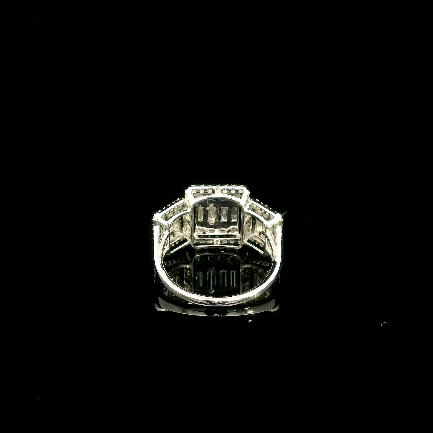 Round and baguette diamond statement ring in 18K white gold with 1.34 carats of natural diamonds