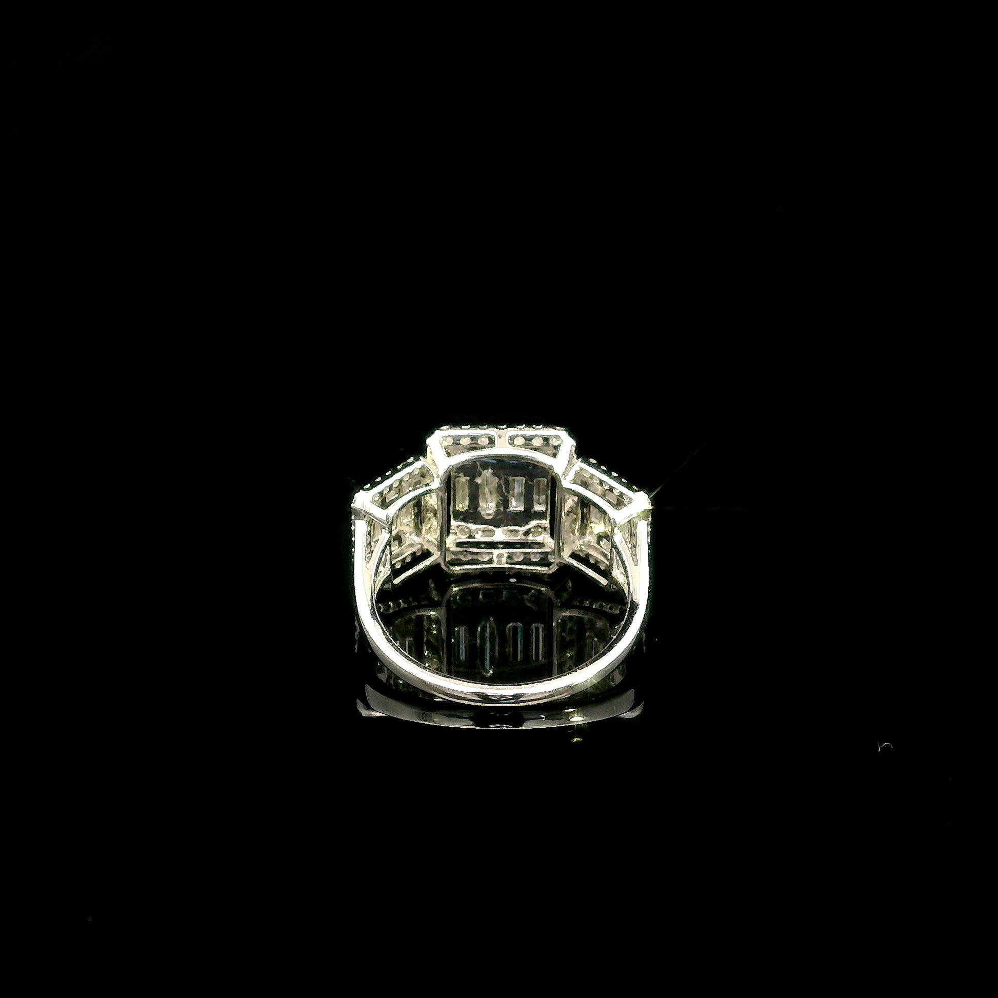 Round and baguette diamond statement ring in 18K white gold with 1.34 carats of natural diamonds