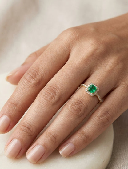 18K yellow gold emerald and diamond halo ring with square green emerald, diamond surround and diamond-set band