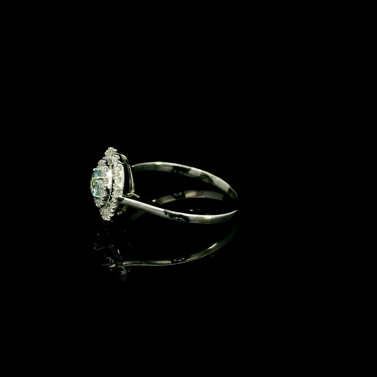 18K white gold aquamarine and diamond double halo ring with round blue aquamarine and two rows of round diamonds