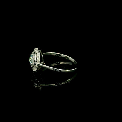 18K white gold aquamarine and diamond double halo ring with round blue aquamarine and two rows of round diamonds