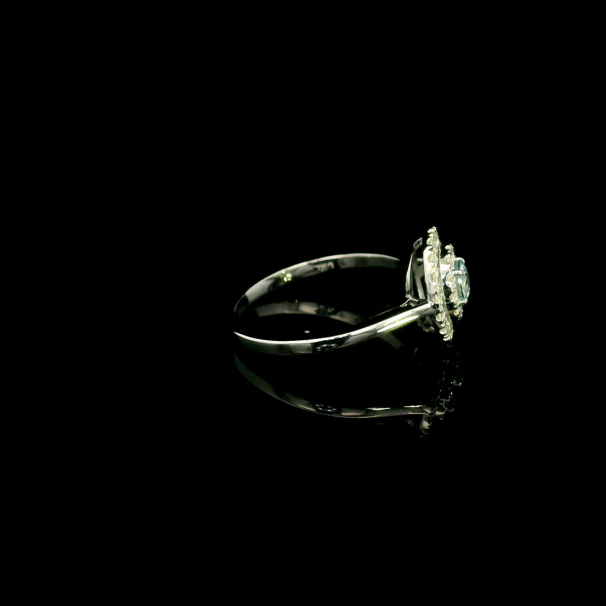 18K white gold aquamarine and diamond double halo ring with round blue aquamarine and two rows of round diamonds
