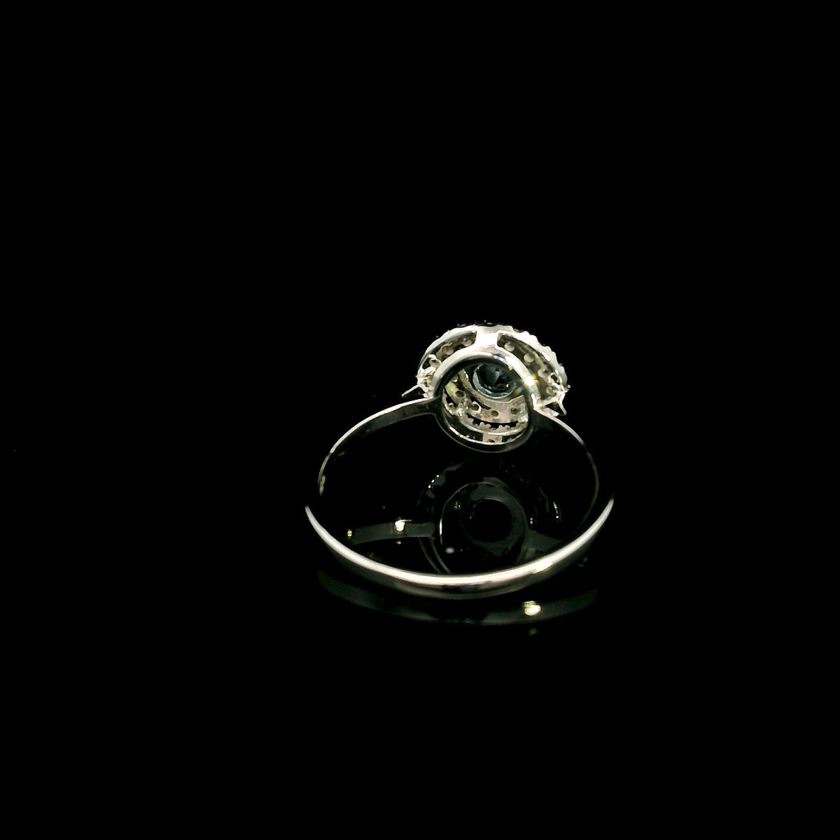18K white gold aquamarine and diamond double halo ring with round blue aquamarine and two rows of round diamonds