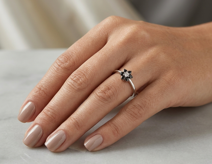 Black diamond flower ring in 18K white gold with black diamond petals and white diamond centre