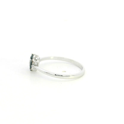 Black diamond flower ring in 18K white gold with black diamond petals and white diamond centre
