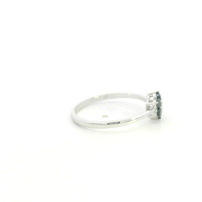Black diamond flower ring in 18K white gold with black diamond petals and white diamond centre
