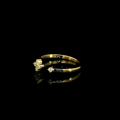 Open diamond flower ring in 18K yellow gold with four-petal diamond floral design and single diamond accent