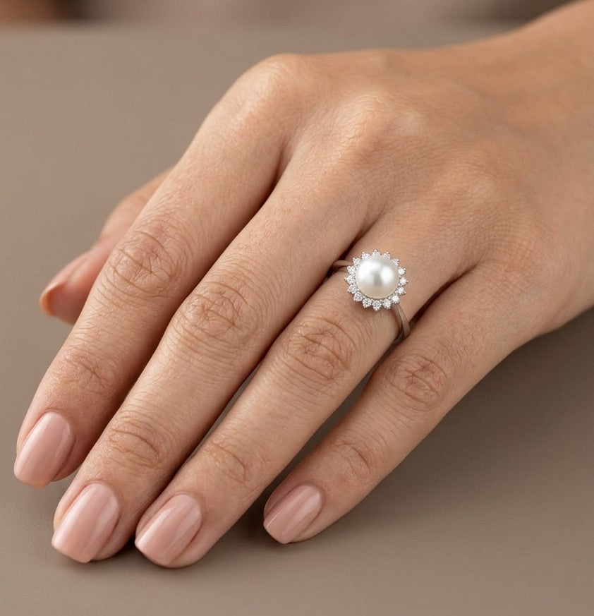 Freshwater pearl and diamond halo ring in 18K white gold with round white pearl and 0.15 carat natural diamonds