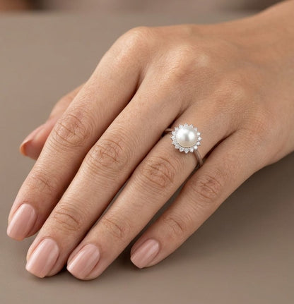 Freshwater pearl and diamond halo ring in 18K white gold with round white pearl and 0.15 carat natural diamonds