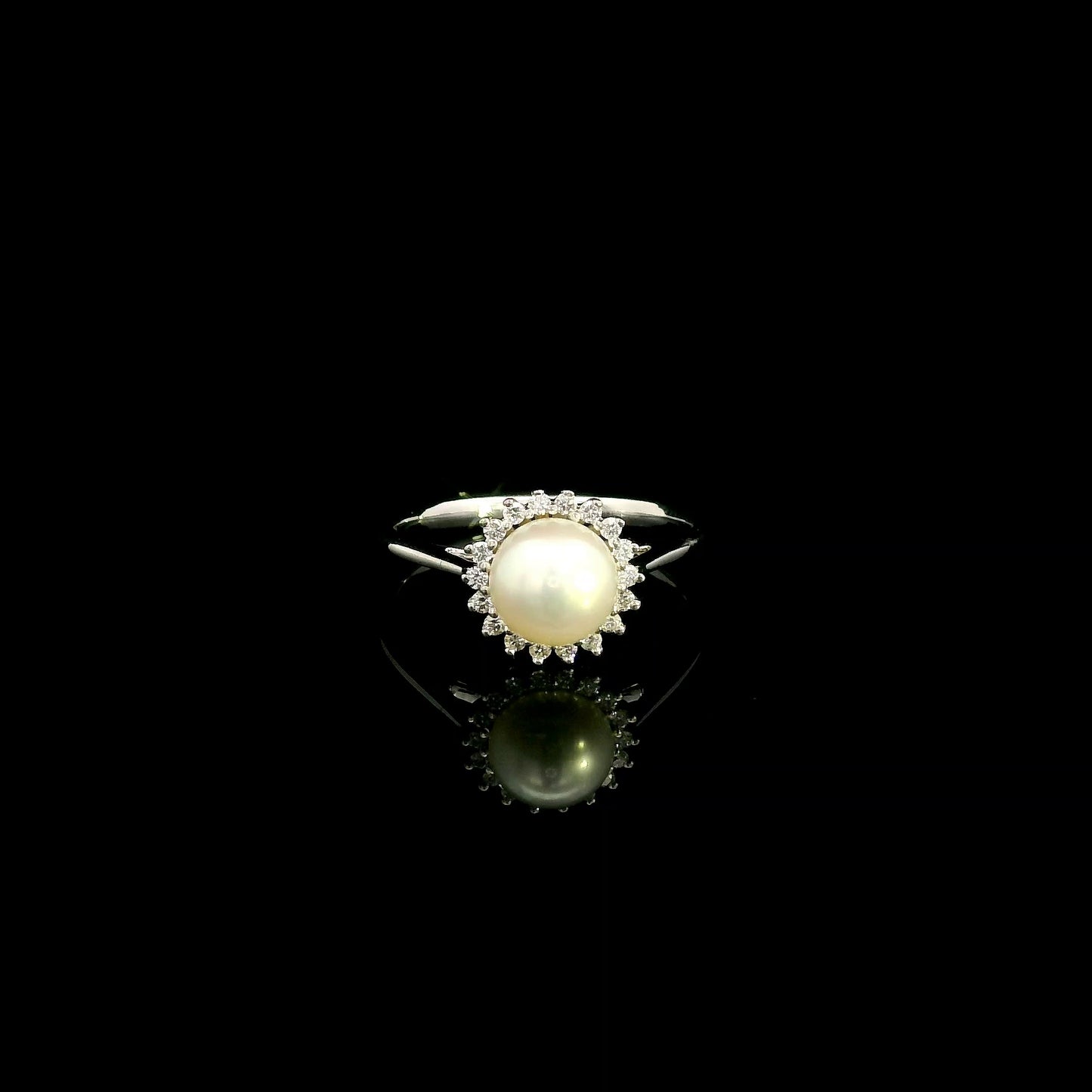 Freshwater pearl and diamond halo ring in 18K white gold with round white pearl and 0.15 carat natural diamonds