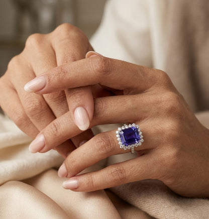 8.78 carat emerald cut tanzanite and diamond halo ring in 18K white gold