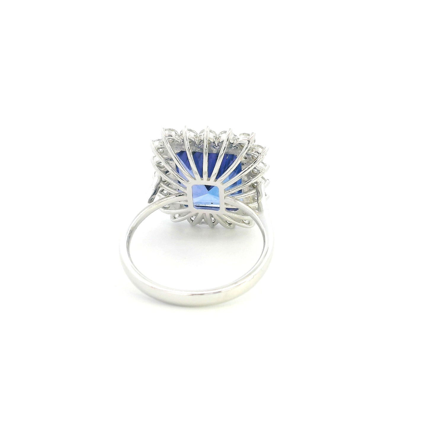 8.78 carat emerald cut tanzanite and diamond halo ring in 18K white gold