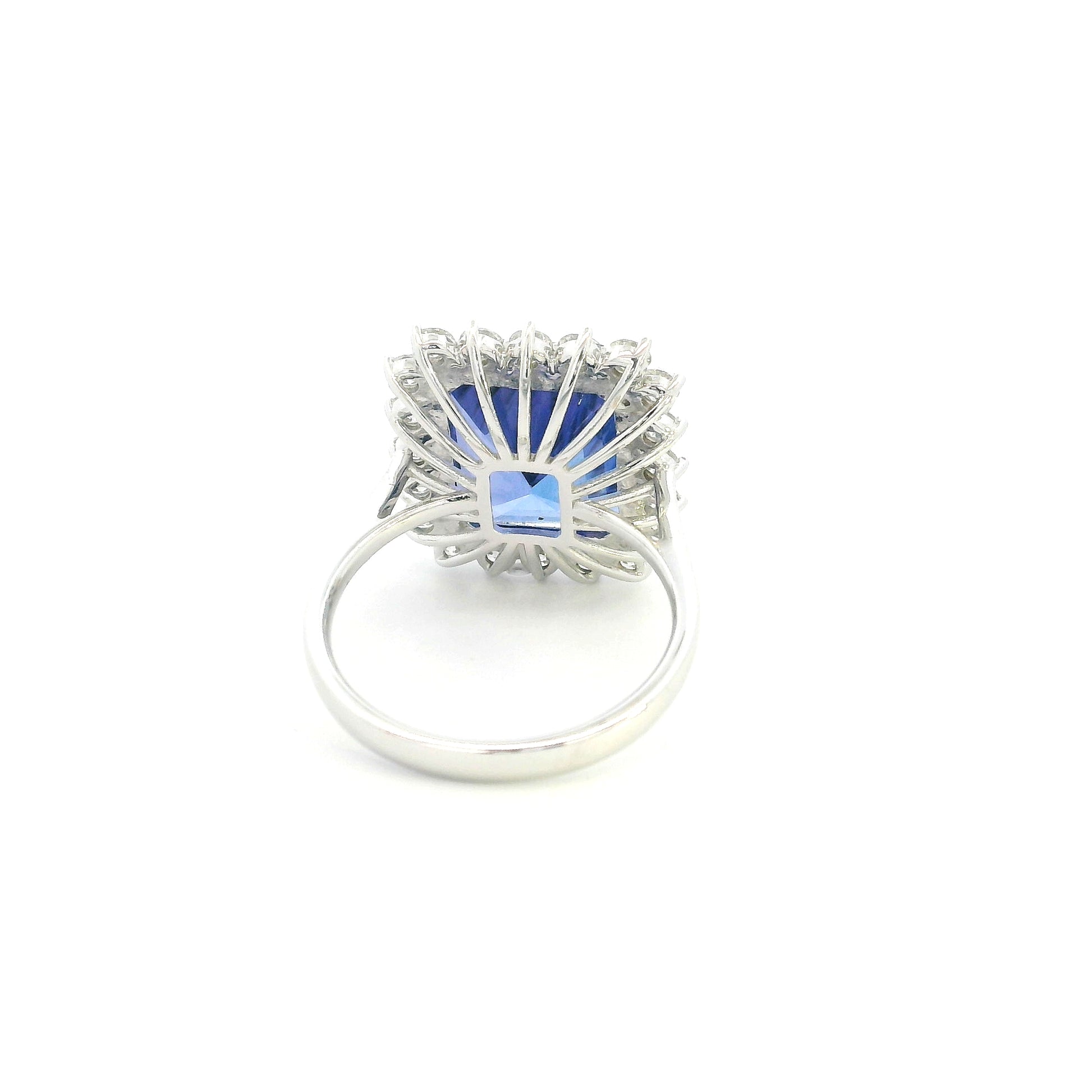 8.78 carat emerald cut tanzanite and diamond halo ring in 18K white gold