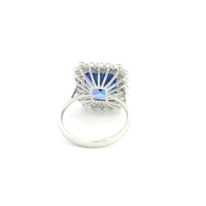 8.78 carat emerald cut tanzanite and diamond halo ring in 18K white gold