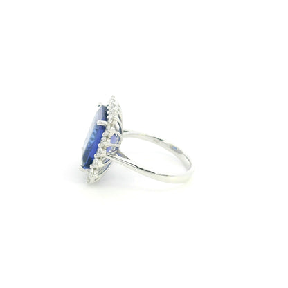 8.78 carat emerald cut tanzanite and diamond halo ring in 18K white gold