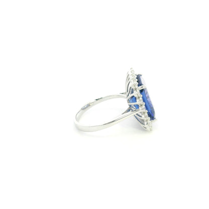 8.78 carat emerald cut tanzanite and diamond halo ring in 18K white gold