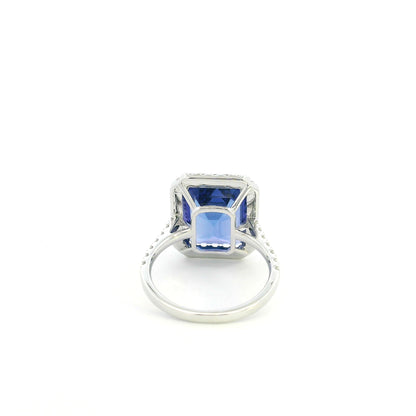 8.20 carat emerald cut tanzanite and diamond halo ring in 18K white gold