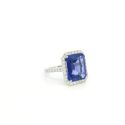 8.20 carat emerald cut tanzanite and diamond halo ring in 18K white gold