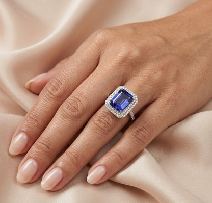 18K white gold tanzanite and diamond double halo statement ring with rectangular blue-violet tanzanite and diamond-set band
