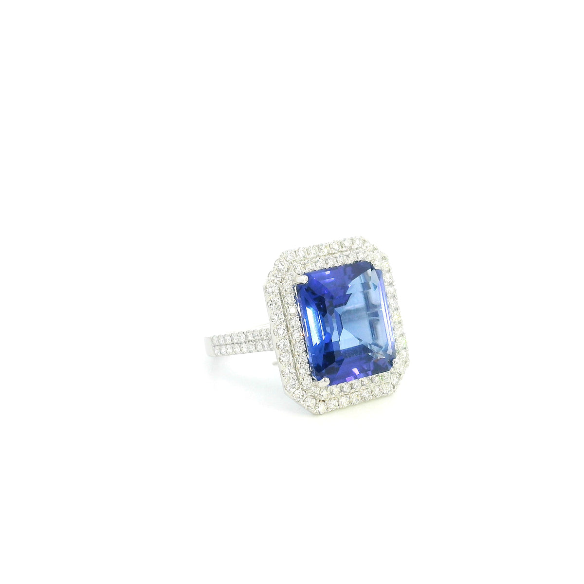 18K white gold tanzanite and diamond double halo statement ring with rectangular blue-violet tanzanite and diamond-set band