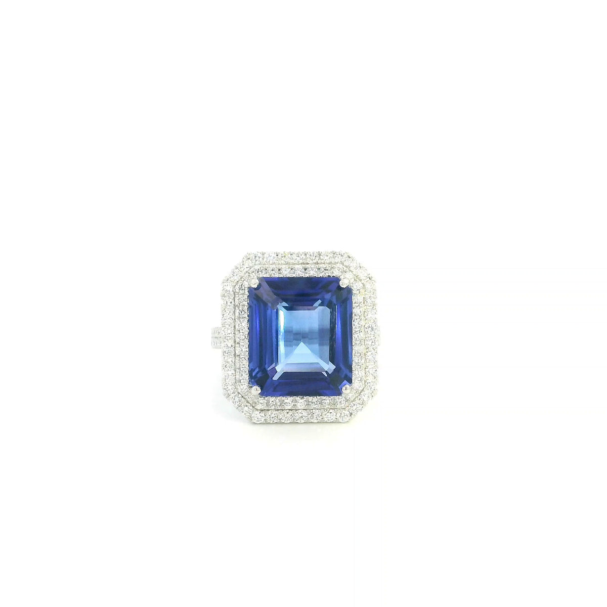 18K white gold tanzanite and diamond double halo statement ring with rectangular blue-violet tanzanite and diamond-set band