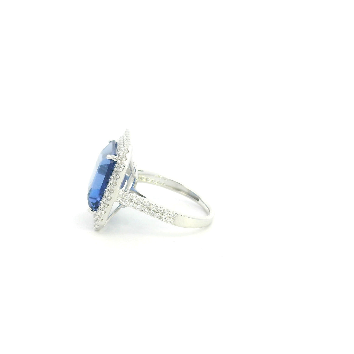 18K white gold tanzanite and diamond double halo statement ring with rectangular blue-violet tanzanite and diamond-set band