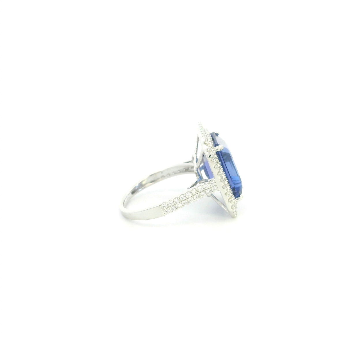 18K white gold tanzanite and diamond double halo statement ring with rectangular blue-violet tanzanite and diamond-set band