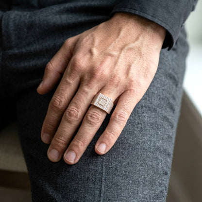 Men’s diamond statement ring in 18K rose gold with a rectangular pavé diamond face, geometric centre and diamond-set sides