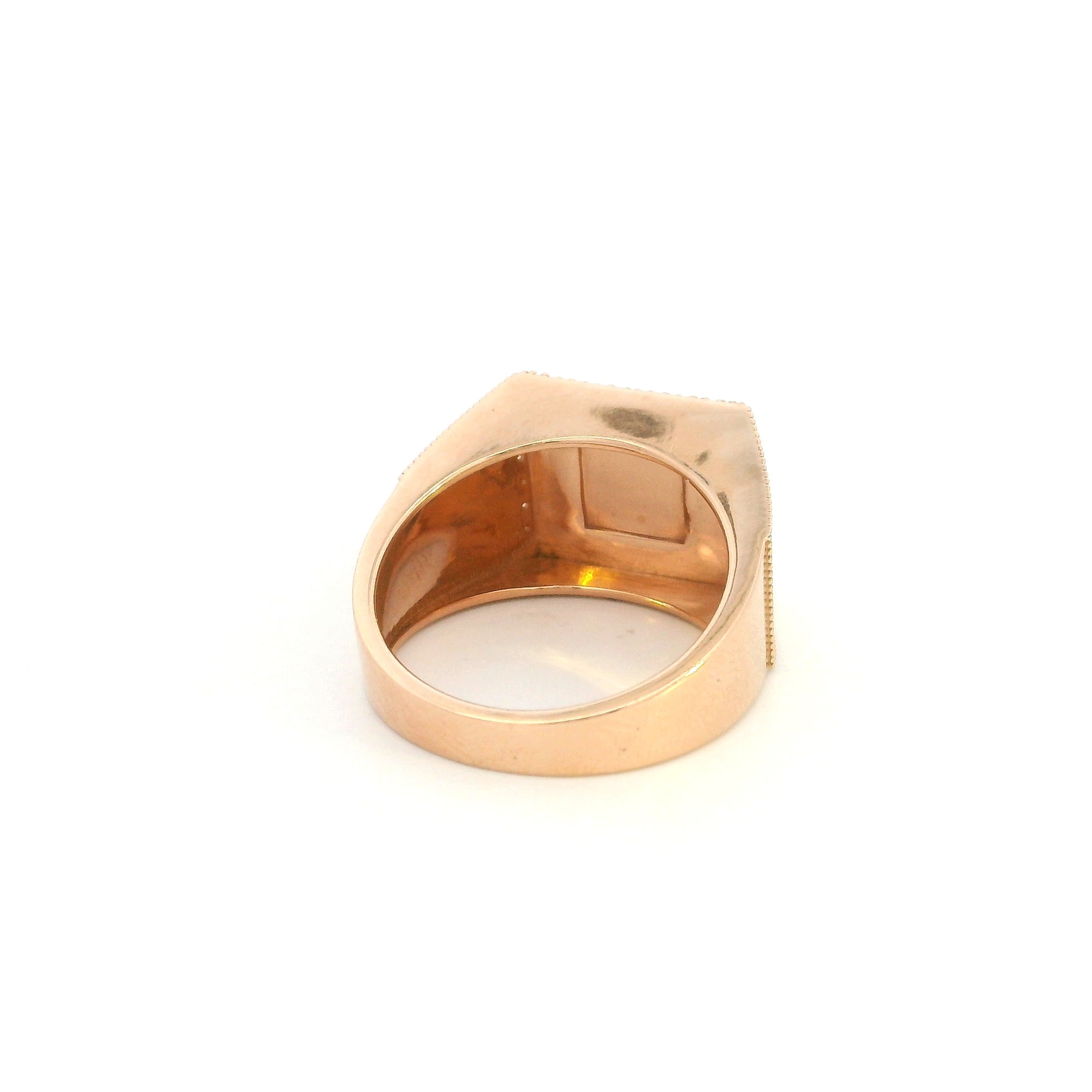 Men’s diamond statement ring in 18K rose gold with a rectangular pavé diamond face, geometric centre and diamond-set sides