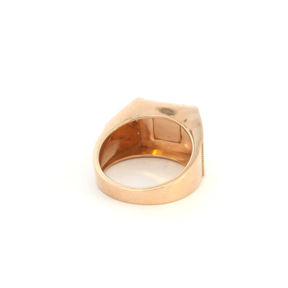 Men’s diamond statement ring in 18K rose gold with a rectangular pavé diamond face, geometric centre and diamond-set sides