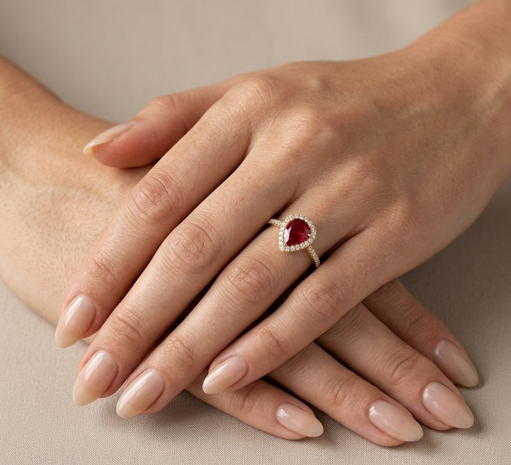 Pear Shaped Ruby and Diamond Halo Ring in 18K Yellow Gold