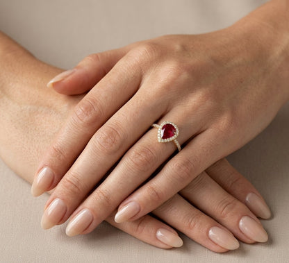 Pear Shaped Ruby and Diamond Halo Ring in 18K Yellow Gold