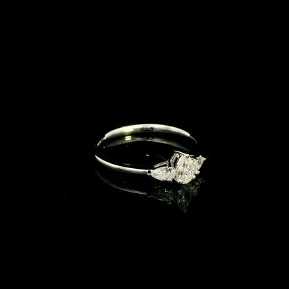 Pear shaped three stone diamond engagement ring in 18K white gold