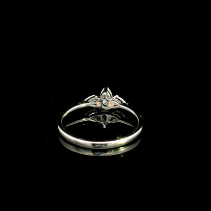 Pear shaped three stone diamond engagement ring in 18K white gold