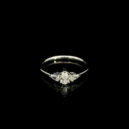 Pear shaped three stone diamond engagement ring in 18K white gold