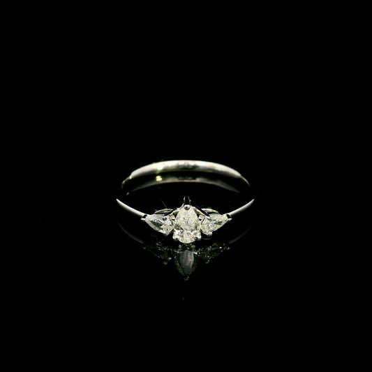 Pear shaped three stone diamond engagement ring in 18K white gold