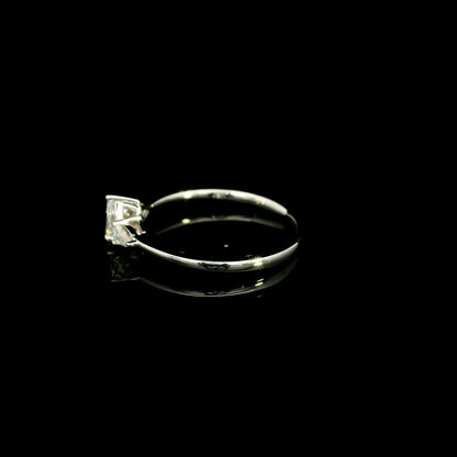 Pear shaped three stone diamond engagement ring in 18K white gold
