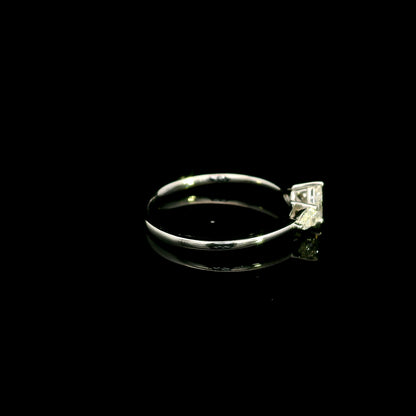 Pear shaped three stone diamond engagement ring in 18K white gold