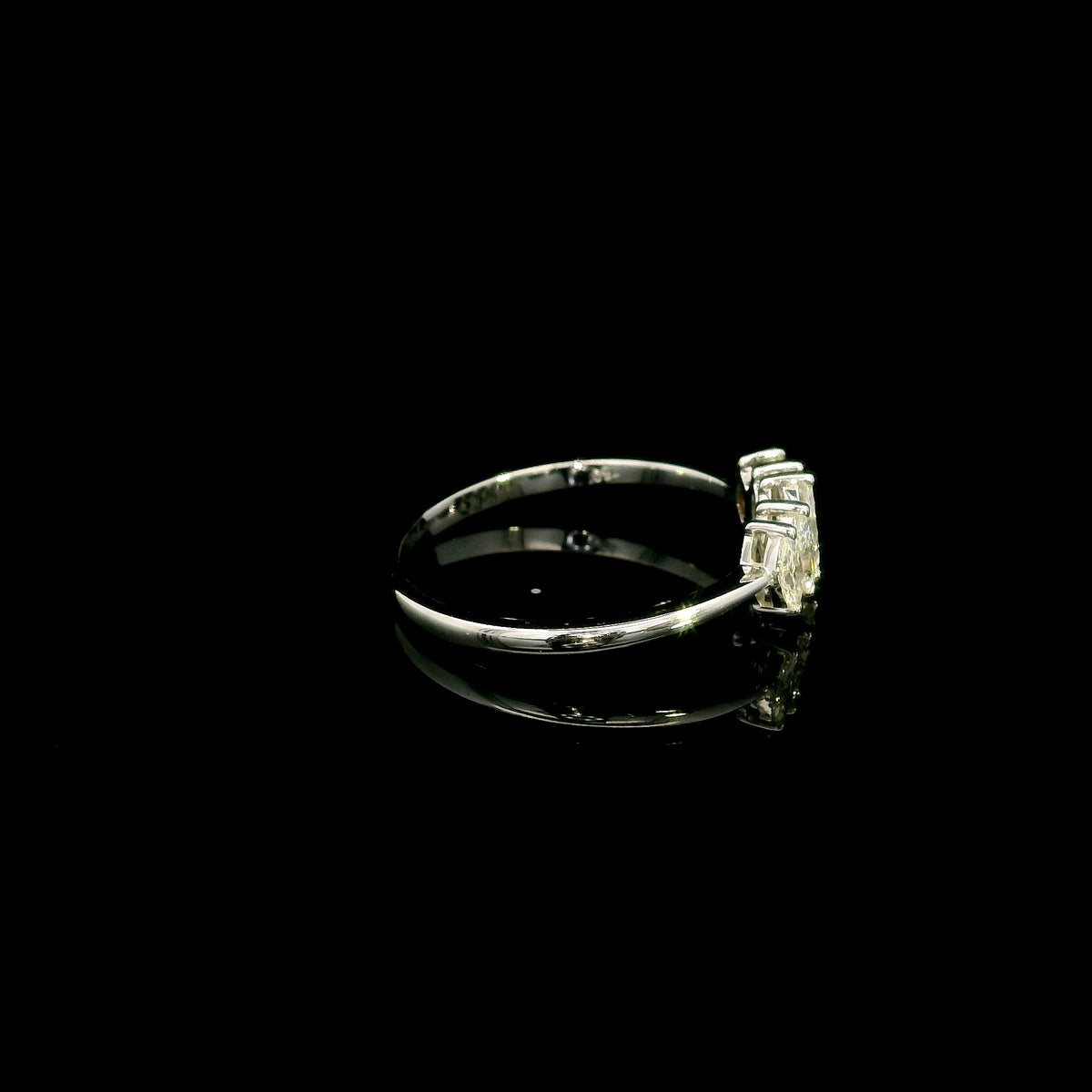 18K white gold five stone marquise diamond ring with five marquise cut diamonds set across the finger