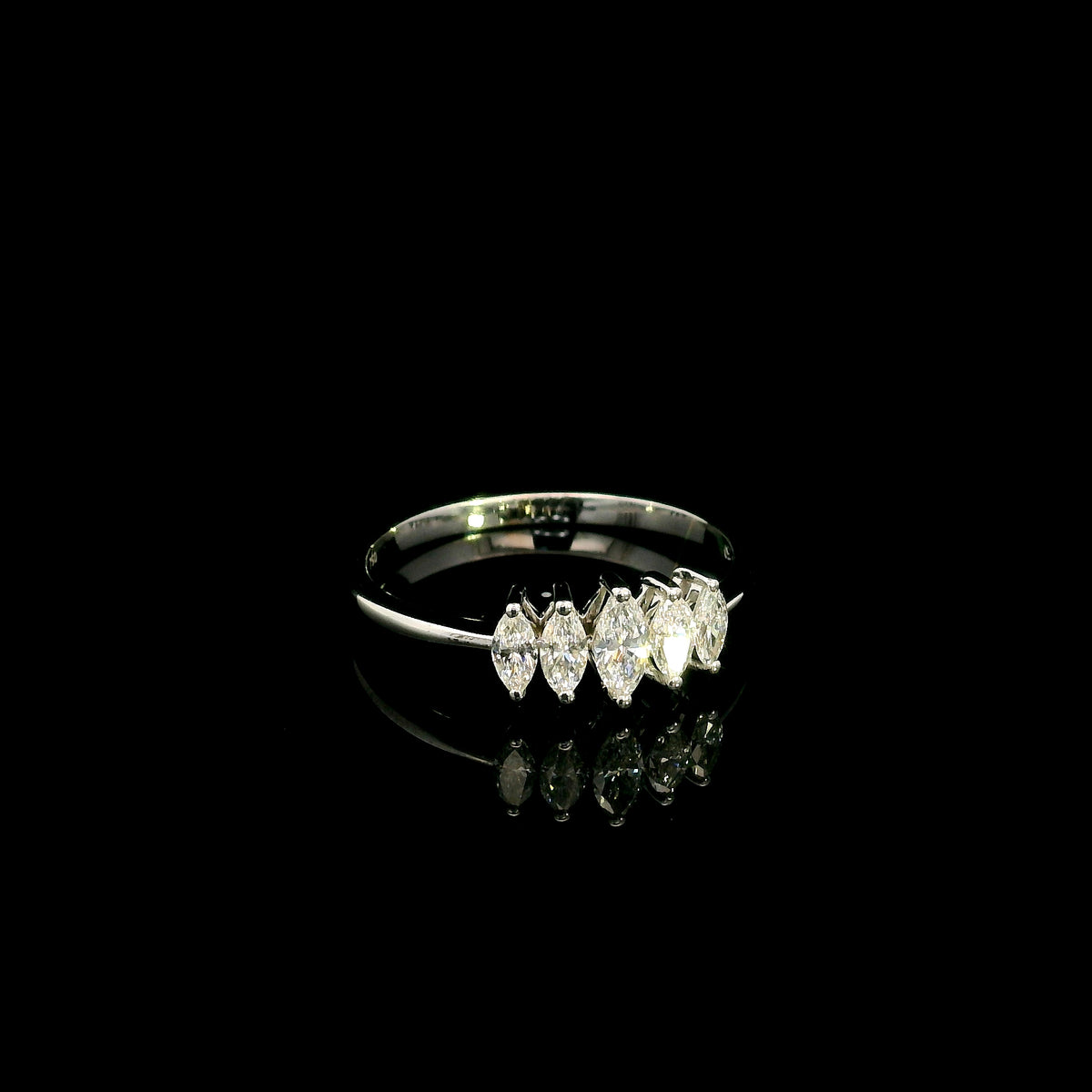 18K white gold five stone marquise diamond ring with five marquise cut diamonds set across the finger