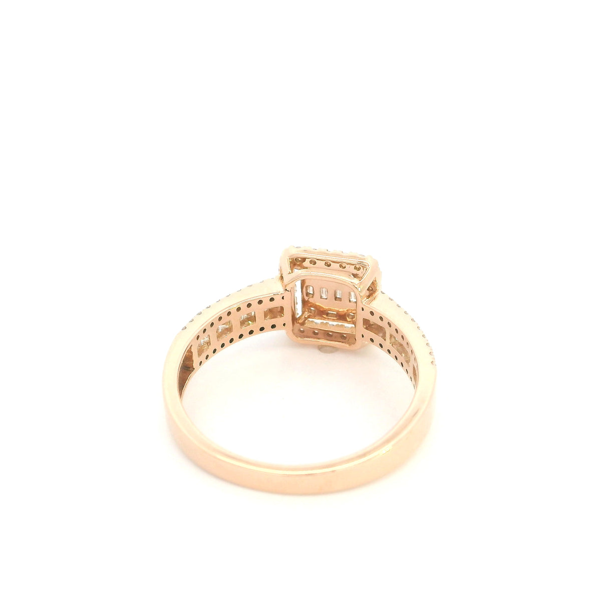 18K rose gold statement ring featuring baguette and round diamonds in a rectangular geometric design