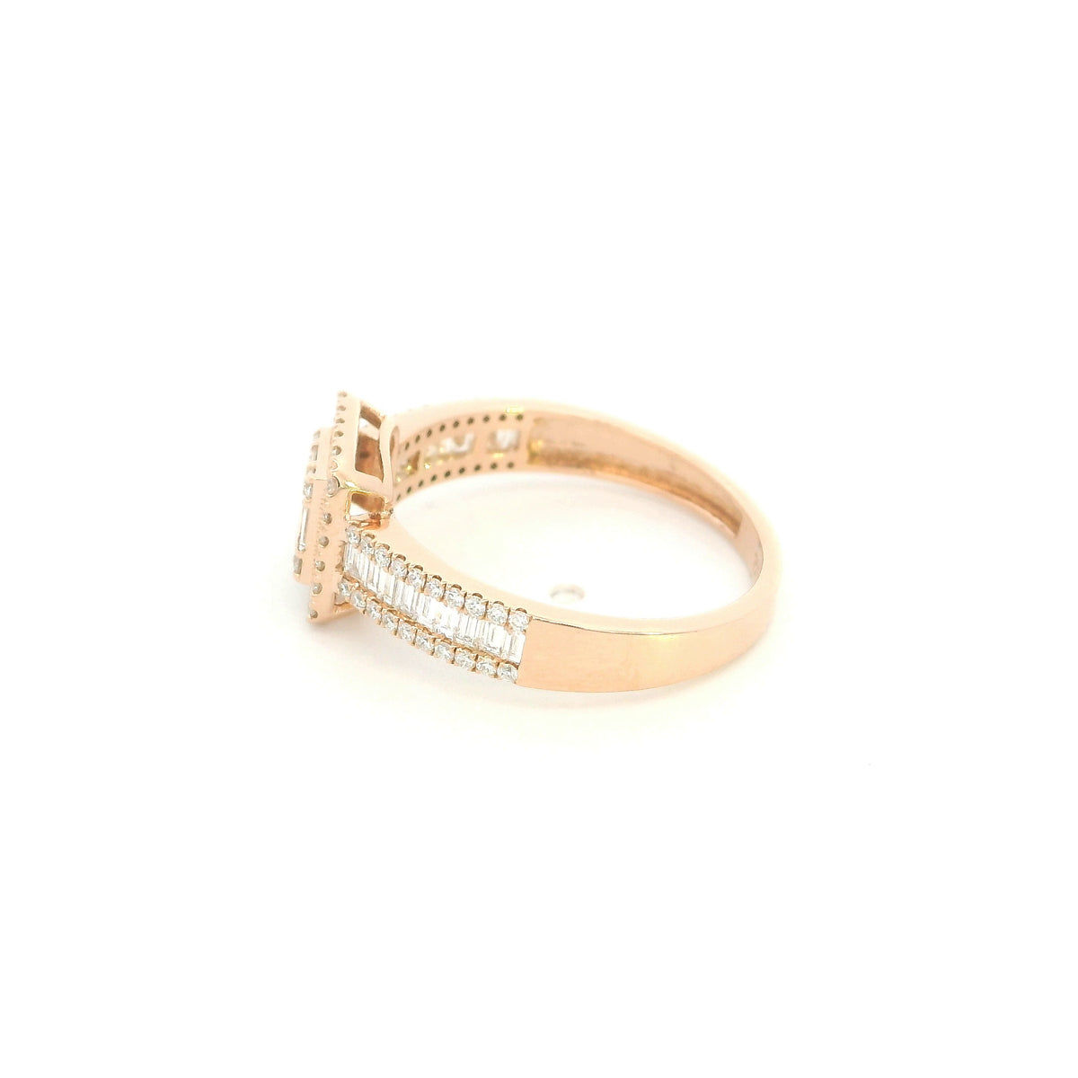 18K rose gold statement ring featuring baguette and round diamonds in a rectangular geometric design