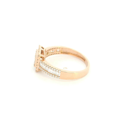 18K rose gold statement ring featuring baguette and round diamonds in a rectangular geometric design