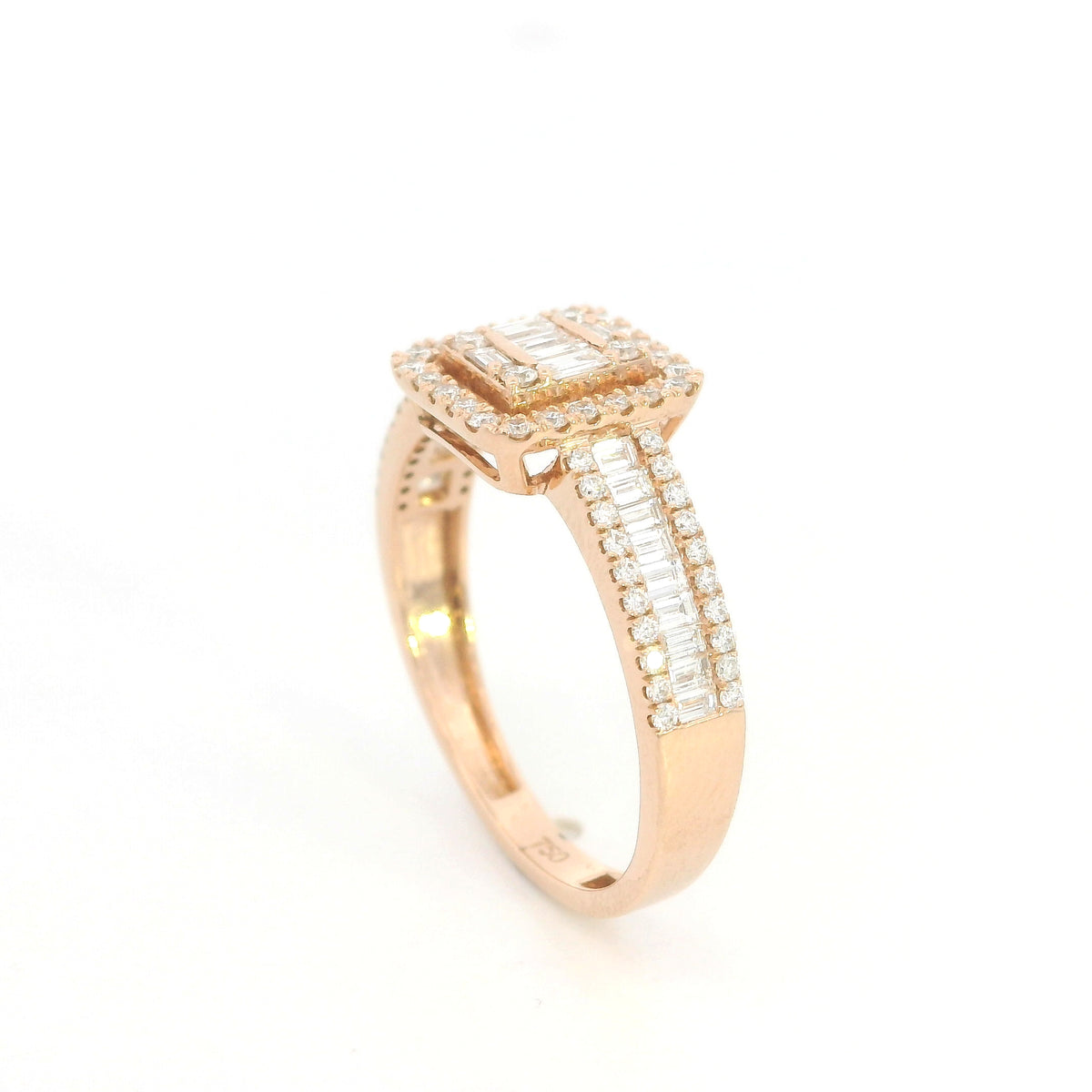 18K rose gold statement ring featuring baguette and round diamonds in a rectangular geometric design