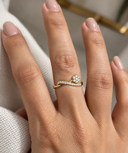 Diamond cluster crossover ring with round diamonds in 18K yellow gold by Emirates Diamonds